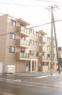 札幌市北区北二十五条西のマンションの建物外観