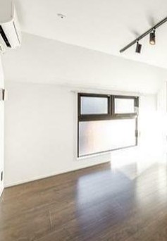 アステラホーム四谷大京町の居間写真