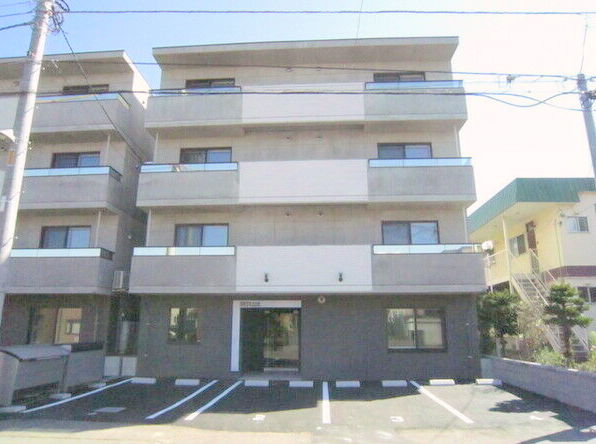 札幌市豊平区平岸一条のマンションの建物外観