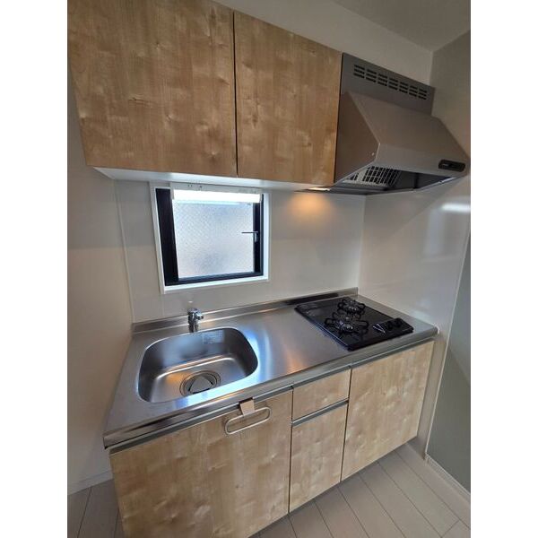 キッチン　※写真は同じマンションの違う部屋のものになります。