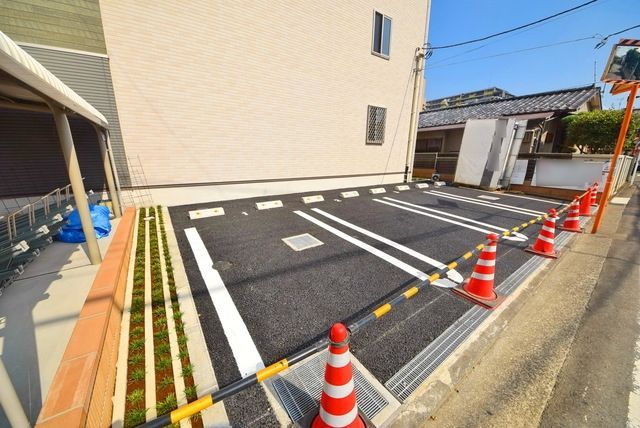 駐車場　タウンハウジング府中店まで