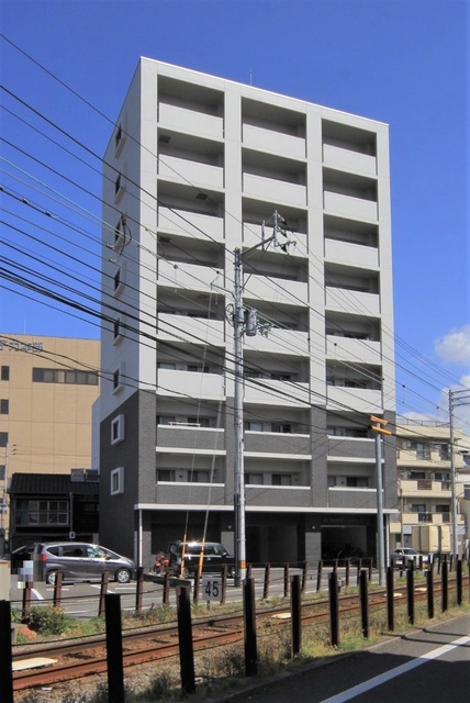 【松山市北藤原町のマンションの建物外観】