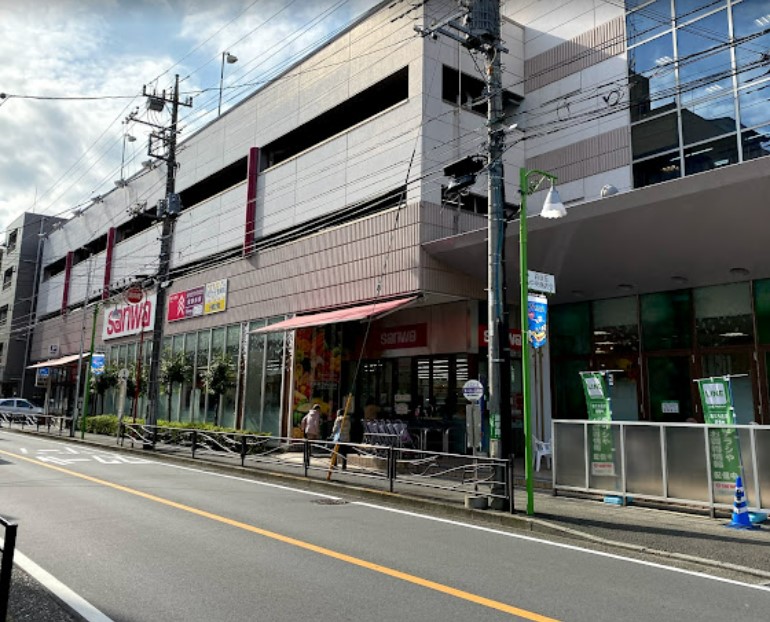 スーパー　三和 百合ヶ丘店（スーパー）まで306m