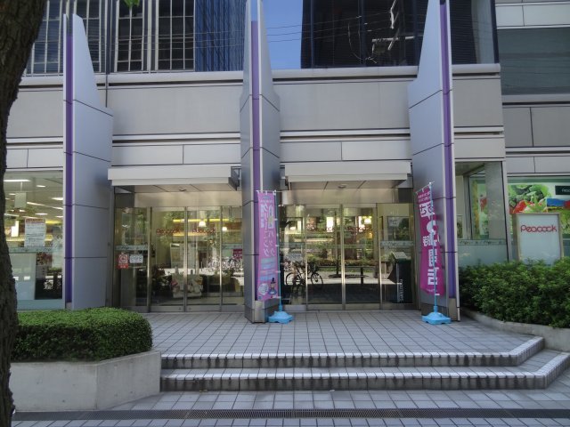 スーパー　ピーコックストア西梅田店（スーパー）まで875m
