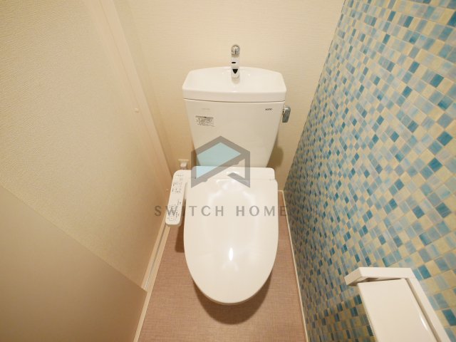 トイレ　落ち着いた色調のトイレです