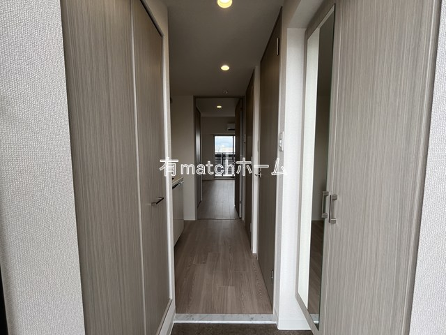 ファーストフィオーレ十三エリオの玄関写真