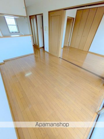 西都フェニックスMの居間写真