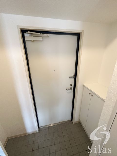 地下鉄谷町線 野江内代駅 徒歩7分 7階建 築16年の玄関写真