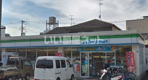 コンビニ　ファミリーマート堺錦綾町店（コンビニ）まで398m