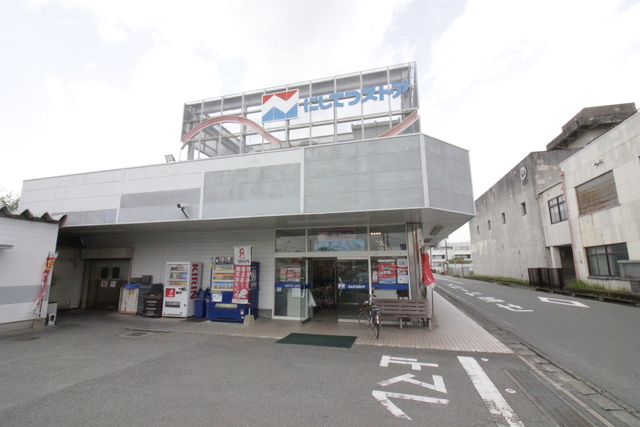 スーパー　西鉄ストア明治町店（スーパー）まで950m