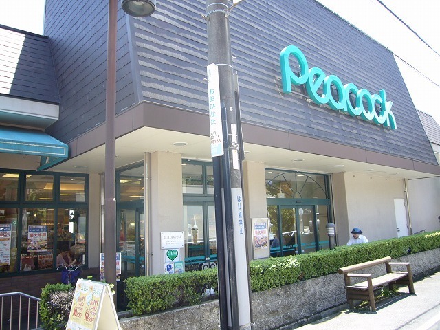 スーパー　ピーコックストア箕面桜ケ丘店（スーパー）まで980m