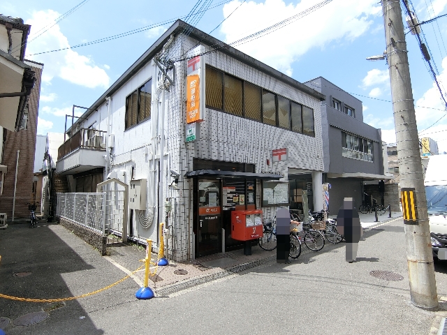郵便局　茨木高瀬郵便局（郵便局）まで521m
