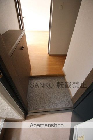 地下鉄南北線 麻生駅 徒歩12分 4階建 築34年の玄関写真