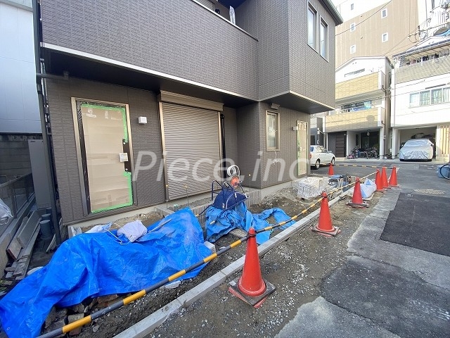 【大阪市都島区毛馬町のマンションのエントランス】