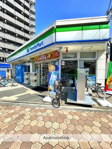 コンビニ　ファミリーマート関目高殿駅西店（コンビニ）まで595m