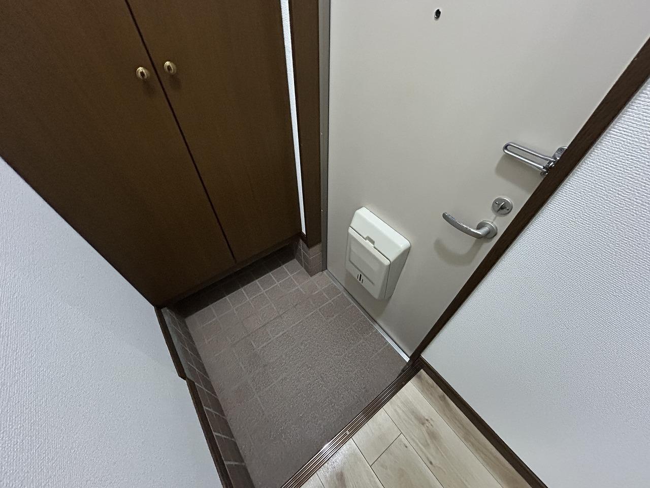 コスモスの玄関写真