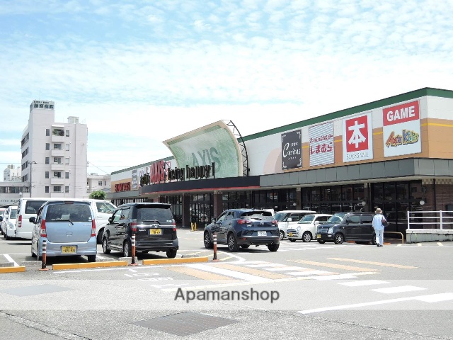 スーパー　サニーアクシス南国店（スーパー）まで595m