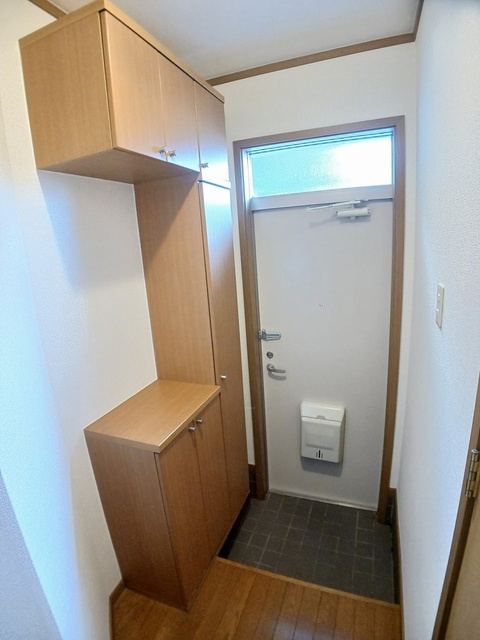 ライジングヒルズの玄関写真