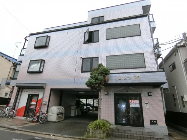 寝屋川市木屋元町のマンションの建物外観