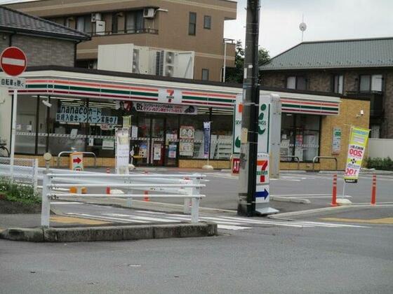 コンビニ　セブンイレブン越谷蒲生茜町店（コンビニ）まで210m