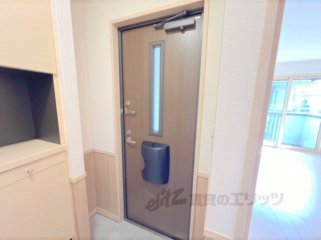コンフォートくすはA棟の玄関写真