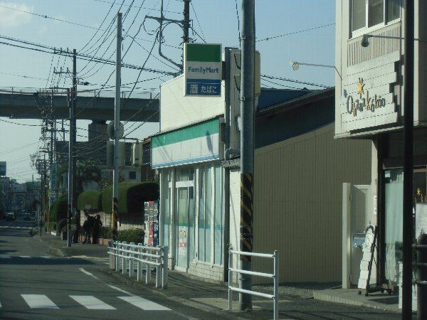 コンビニ　ファミリーマート蔭山馬堀海岸店（コンビニ）まで700m