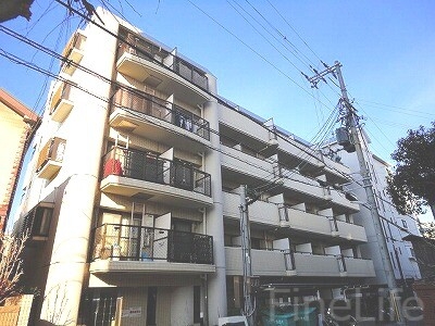 【神戸市垂水区平磯のマンションの建物外観】