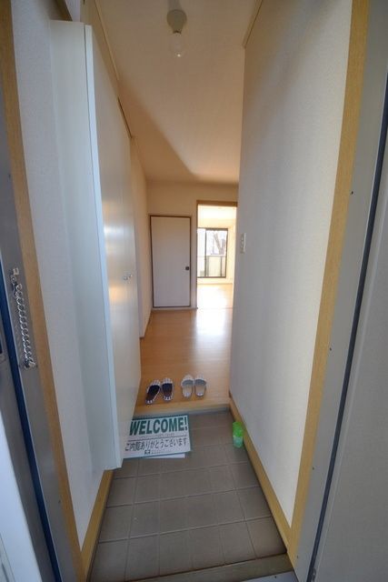 玄関　お問合せはタウンハウジングまで