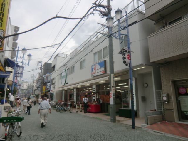 コンビニ　スーパー田中旭町本店（コンビニ）まで370m