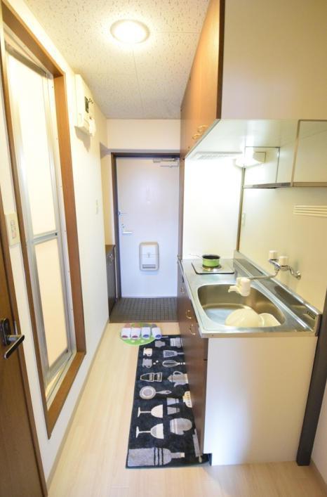 KMマンション八幡駅前の玄関写真