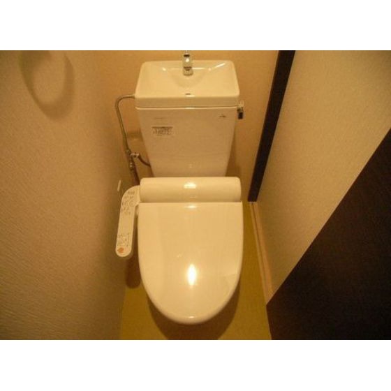 西鉄貝塚線 貝塚駅 徒歩10分 10階建 築15年のトイレ写真