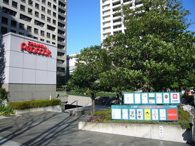 スーパー　ピーコックストアグランパーク田町店（スーパー）まで558m