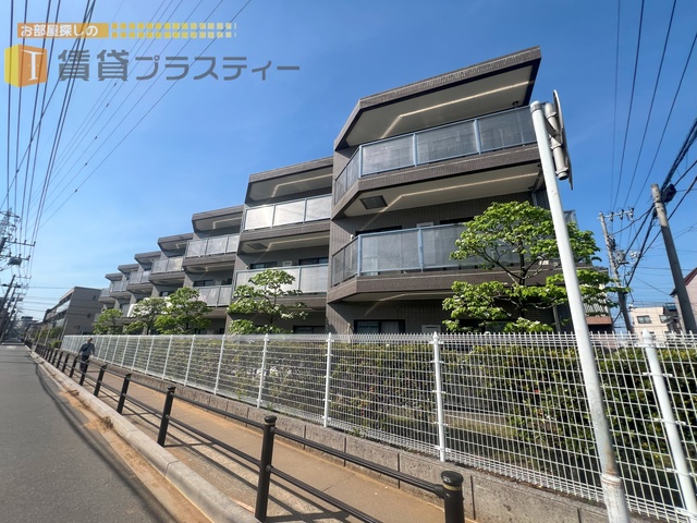 建物外観　雁行型により採光良好です。まさに列を成して飛ぶ雁の姿。