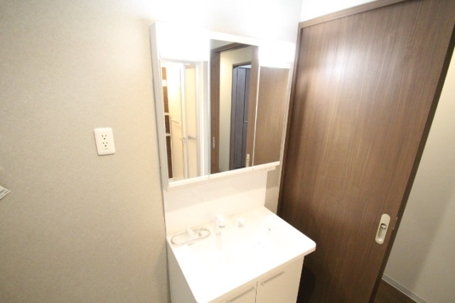 洗面設備　※１０１号室の写真です