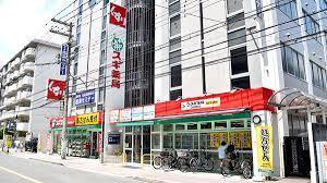 ドラックストア　スギ薬局江坂垂水町店（ドラッグストア）まで420m