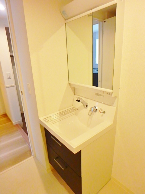 洗面設備　同施工会社の参考写真になります。