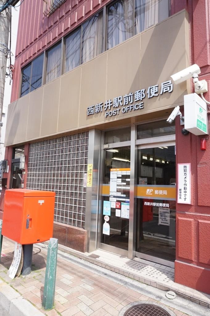 郵便局　西新井駅前郵便局（郵便局）まで610m