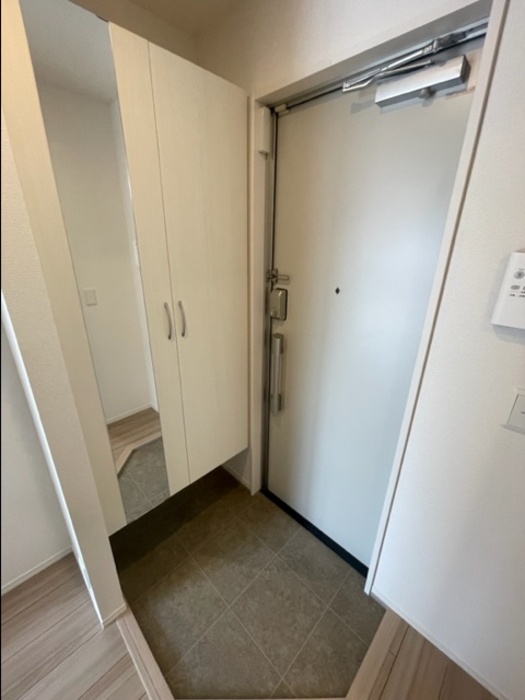 玄関　スペチアーレ万代