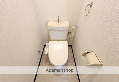 熊本市西区 3階建 築32年のトイレ写真