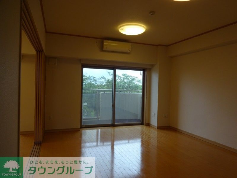 T s garden北柏2号棟の居間写真
