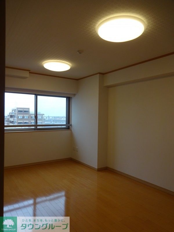 T s garden北柏2号棟の居間写真