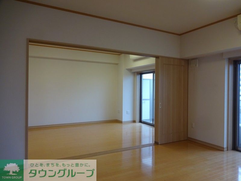 T s garden北柏2号棟の居間写真