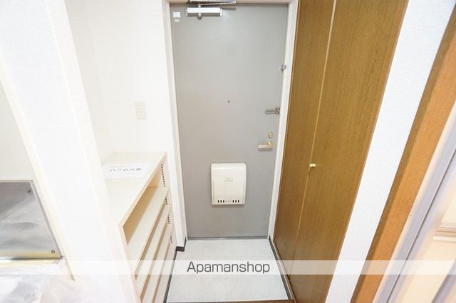 アルファ千里丘の玄関写真