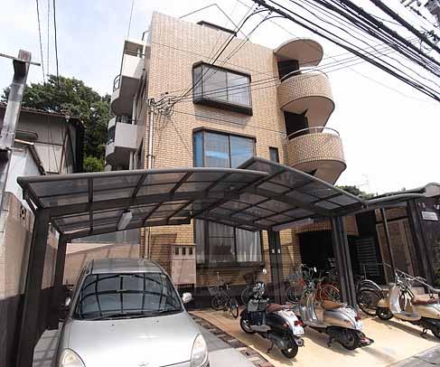 京都市伏見区桃山町泰長老のマンションの建物外観