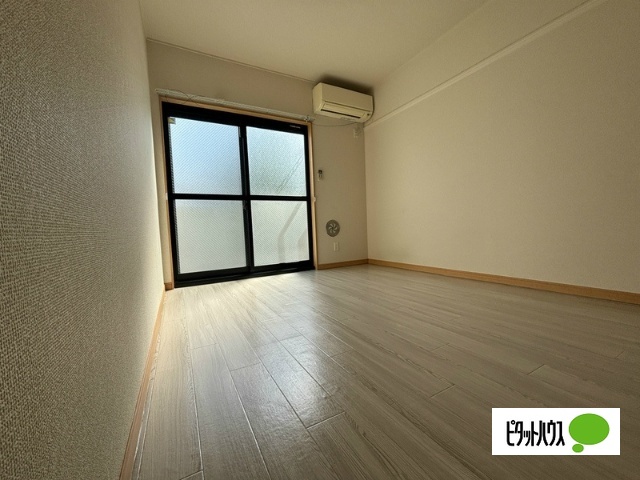 レオパレスSHISUI A棟の居間写真