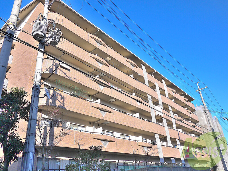 【吹田市佐井寺のマンションの建物外観】