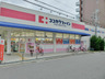 ドラックストア　ココカラファイン西田店（ドラッグストア）まで394m