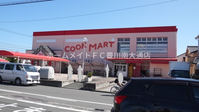 スーパー　クックマートユーアイ店（スーパー）まで386m