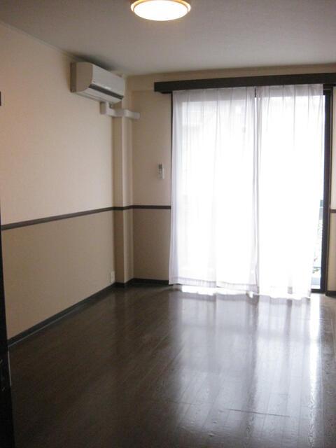 居室・リビング　別号室の写真を使用しています?