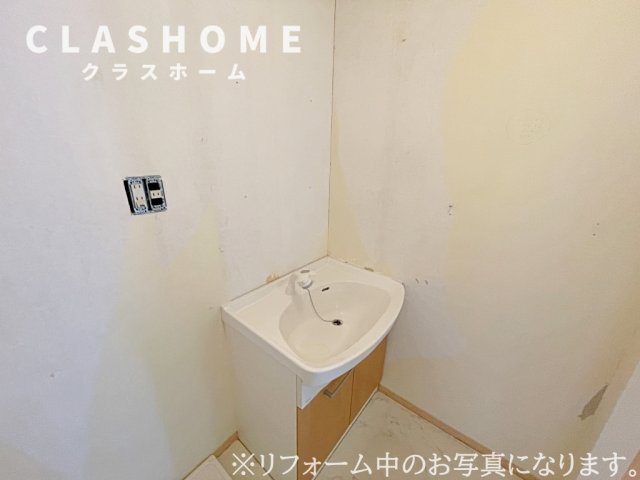 洗面設備　同物件の別部屋になります。